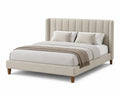 Lit plateforme en tissu beige avec tête de lit rembourrée