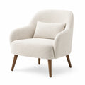 Fauteuil en tissu bouclé avec pieds en bois